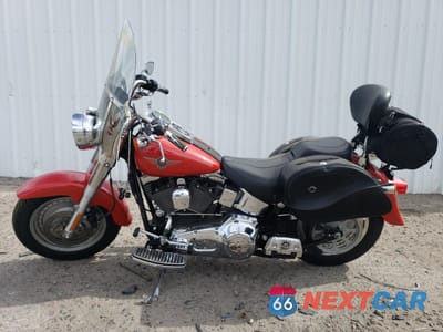 Trzecie zdjęcie samochodu z tyłu: 2002 HARLEY-DAVIDSON FLSTFI VIN:1HD1BXB142Y085439 - miniatura