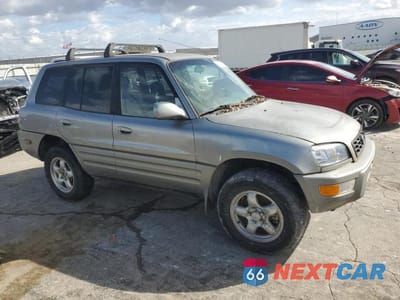 Czwarte zdjęcie samochodu z boku: 1999 TOYOTA RAV4 BASE VIN:JT3HP10V5X7130071 - miniatura