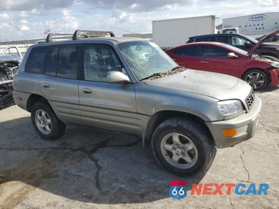 Czwarte zdjęcie samochodu z boku: 1999 TOYOTA RAV4 BASE VIN:JT3HP10V5X7130071 - miniatura