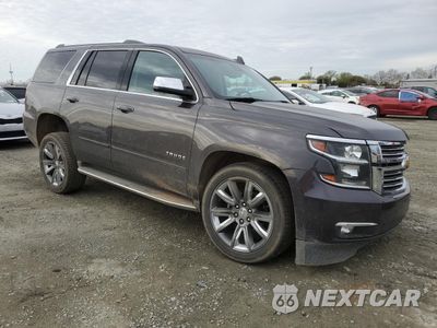 Czwarte zdjęcie samochodu z boku: 2016 CHEVROLET TAHOE C1500 LTZ VIN:1GNSCCKC0GR203654 - miniatura