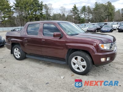 Czwarte zdjęcie samochodu z boku: 2010 HONDA RIDGELINE RTL VIN:5FPYK1F52AB012134 - miniatura