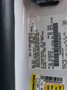 Zdjęcie 12 z 12 samochodu: 2013 FORD FUSION TITANIUM HEV VIN:3FA6P0RU2DR362919 - miniatura