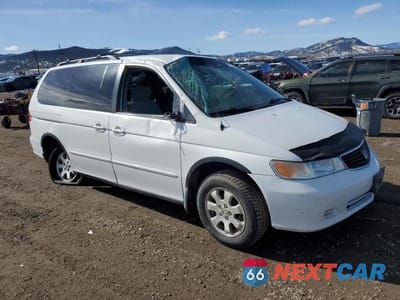 Czwarte zdjęcie samochodu z boku: 2001 HONDA ODYSSEY EX VIN:2HKRL18661H543855 - miniatura