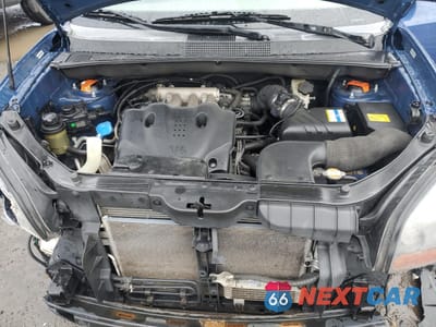Zdjęcie 12 z 13 samochodu: 2009 HYUNDAI TUCSON SE VIN:KM8JN72D39U933682 - miniatura