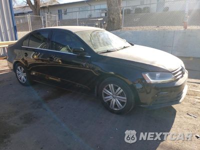 Czwarte zdjęcie samochodu z boku: 2017 VOLKSWAGEN JETTA S VIN:3VW2B7AJ4HM328403 - miniatura