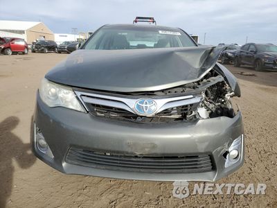 Piąte zdjęcie samochodu w środku: 2012 TOYOTA CAMRY HYBRID VIN:4T1BD1FKXCU057956 - miniatura