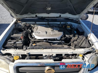 Zdjęcie 12 z 13 samochodu: 2004 NISSAN PATHFINDER LE VIN:JN8DR09YX4W910746 - miniatura