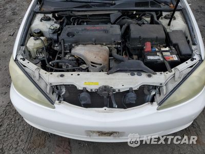 Zdjęcie 11 z 12 samochodu: 2005 TOYOTA COROLLA MATRIX XR VIN:2T1KR32E45C323005 - miniatura