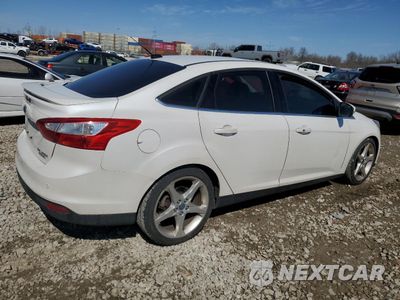 Trzecie zdjęcie samochodu z tyłu: 2014 FORD FOCUS TITANIUM VIN:1FADP3J22EL135247 - miniatura
