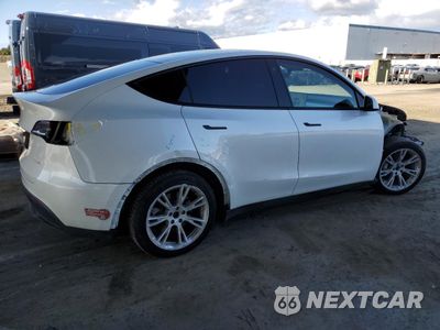 Trzecie zdjęcie samochodu z tyłu: 2023 TESLA MODEL Y VIN:7SAYGAEE2PF738910 - miniatura