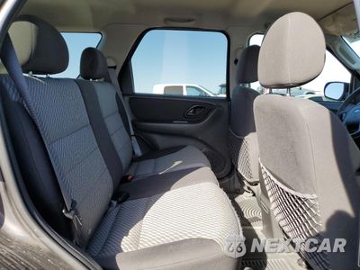 Zdjęcie 11 z 13 samochodu: 2003 FORD ESCAPE XLT VIN:1FMYU03103KC43310 - miniatura