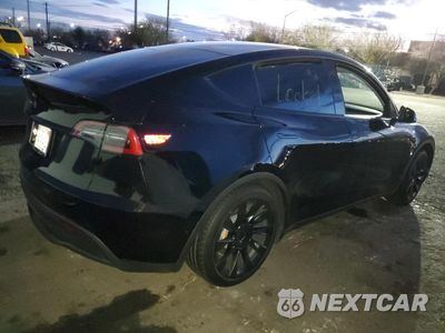 Trzecie zdjęcie samochodu z tyłu: 2021 TESLA MODEL Y VIN:5YJYGDEEXMF188737 - miniatura