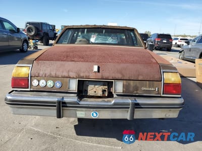 Zdjęcie 6 z 12 samochodu: 1984 OLDSMOBILE DELTA 88 ROYALE BROUGHAM VIN:1G3AY69YXE9725875 - miniatura