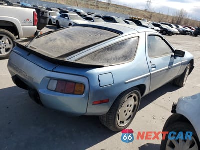 Trzecie zdjęcie samochodu z tyłu: 1985 PORSCHE 928 S VIN:WP0JB092XFS860634 - miniatura