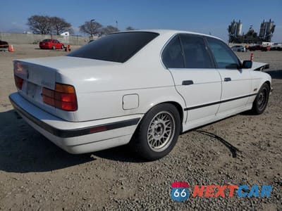 Trzecie zdjęcie samochodu z tyłu: 1995 BMW 540 I VIN:WBAHE5328SGA64005 - miniatura