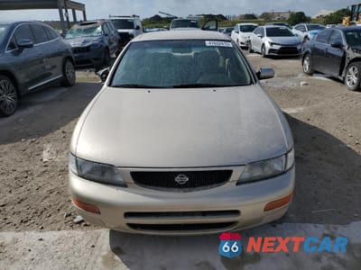 Piąte zdjęcie samochodu w środku: 1995 NISSAN MAXIMA GLE VIN:JN1CA21D1ST067119 - miniatura