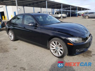 Czwarte zdjęcie samochodu z boku: 2015 BMW 320 I VIN:WBA3B1G5XFNT63736 - miniatura