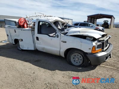 Czwarte zdjęcie samochodu z boku: 1999 FORD F250 SUPER DUTY VIN:1FTNF20S8XEA57206 - miniatura