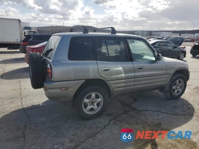 Trzecie zdjęcie samochodu z tyłu: 1999 TOYOTA RAV4 BASE VIN:JT3HP10V5X7130071 - miniatura