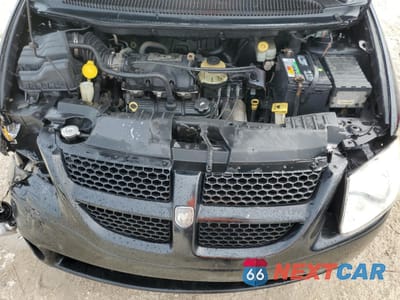 Zdjęcie 12 z 13 samochodu: 2004 DODGE GRAND CARAVAN SXT VIN:2D8GP44L24R607309 - miniatura