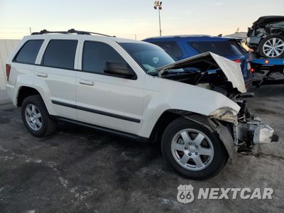 Czwarte zdjęcie samochodu z boku: 2009 JEEP GRAND CHEROKEE LAREDO VIN:1J8GR48K39C539220 - miniatura