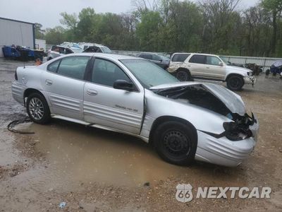 Czwarte zdjęcie samochodu z boku: 2001 PONTIAC GRAND AM SE VIN:1G2NE52T61M642054 - miniatura