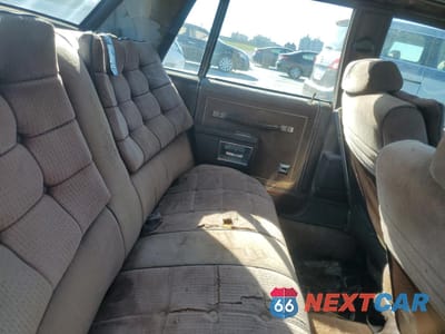 Zdjęcie 10 z 12 samochodu: 1984 OLDSMOBILE DELTA 88 ROYALE BROUGHAM VIN:1G3AY69YXE9725875 - miniatura