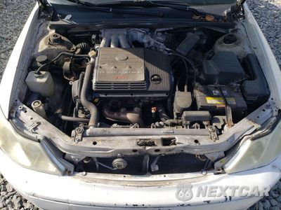 Zdjęcie 11 z 12 samochodu: 2002 TOYOTA AVALON XL VIN:4T1BF28B42U223688 - miniatura