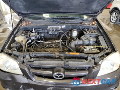 Zdjęcie 12 z 13 samochodu: 2006 MAZDA TRIBUTE I VIN:4F2YZ02Z36KM24578 - miniatura