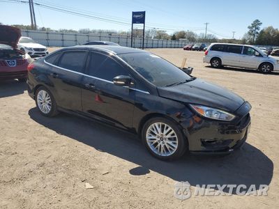Czwarte zdjęcie samochodu z boku: 2016 FORD FOCUS TITANIUM VIN:1FADP3J22GL201721 - miniatura