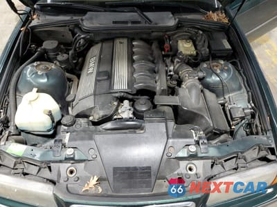 Zdjęcie 11 z 12 samochodu: 1998 BMW 323 IC AUTOMATIC VIN:WBABJ8332WEM22807 - miniatura