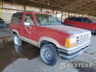 Czwarte zdjęcie samochodu z boku: 1990 FORD BRONCO II VIN:1FMCU12T1LUA11502 - miniatura