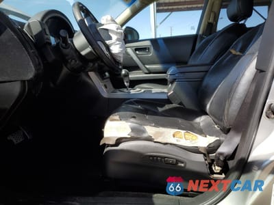 Zdjęcie 7 z 16 samochodu: 2004 INFINITI FX35 VIN:JNRAS08W94X212982 - miniatura