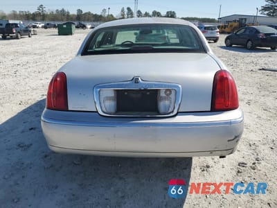 Zdjęcie 6 z 12 samochodu: 2000 LINCOLN TOWN CAR CARTIER VIN:1LNHM83W7YY794283 - miniatura