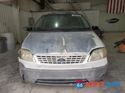 Piąte zdjęcie samochodu w środku: 2001 FORD WINDSTAR LX VIN:2FMZA51411BB21523 - miniatura