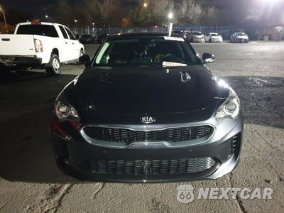 Piąte zdjęcie samochodu w środku: 2019 KIA STINGER VIN:KNAE15LA2K6066020 - miniatura