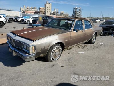 1984 OLDSMOBILE DELTA 88 ROYALE BROUGHAM 1G3AY69YXE9725875 - główne zdjęcie licytacji z USA - miniatura