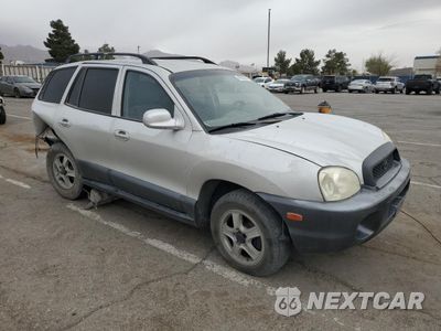Czwarte zdjęcie samochodu z boku: 2004 HYUNDAI SANTA FE GLS VIN:KM8SC13DX4U771225 - miniatura