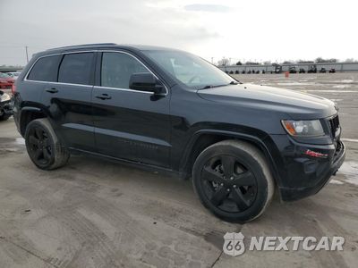 Czwarte zdjęcie samochodu z boku: 2014 JEEP GRAND CHEROKEE LAREDO VIN:1C4RJFAG7EC536095 - miniatura