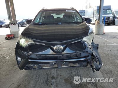 Piąte zdjęcie samochodu w środku: 2017 TOYOTA RAV4 XLE VIN:2T3WFREV3HW315383 - miniatura