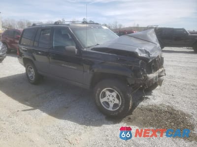 Czwarte zdjęcie samochodu z boku: 1996 JEEP GRAND CHEROKEE LAREDO VIN:1J4EZ58S4TC103918 - miniatura