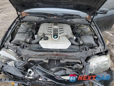 Zdjęcie 11 z 12 samochodu: 2006 BMW 760 LI VIN:WBAHN03556DD98321 - miniatura