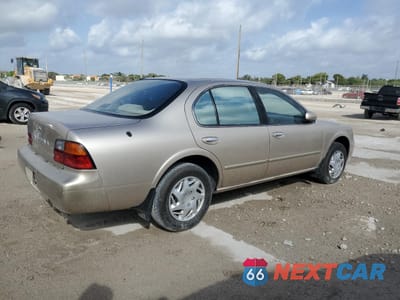 Trzecie zdjęcie samochodu z tyłu: 1995 NISSAN MAXIMA GLE VIN:JN1CA21D1ST067119 - miniatura