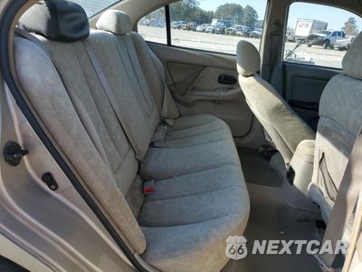 Zdjęcie 11 z 14 samochodu: 2002 HYUNDAI ELANTRA GLS VIN:KMHDN45D22U399216 - miniatura