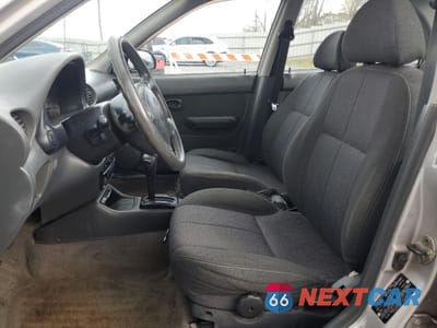 Zdjęcie 7 z 14 samochodu: 1999 HYUNDAI ACCENT GL VIN:KMHVF24N2XU570019 - miniatura