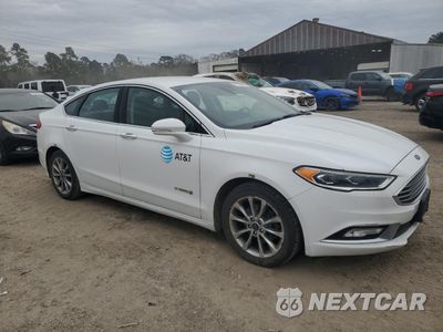 Czwarte zdjęcie samochodu z boku: 2017 FORD FUSION SE HYBRID VIN:3FA6P0LU0HR409265 - miniatura