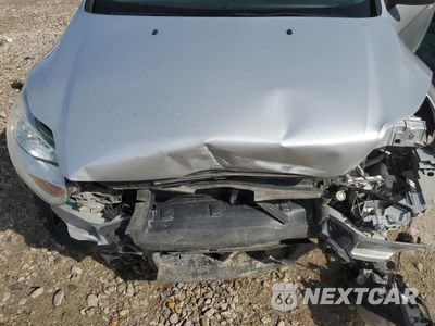 Zdjęcie 12 z 13 samochodu: 2014 FORD FOCUS SE VIN:1FADP3K2XEL439408 - miniatura