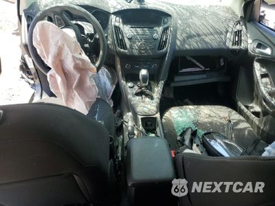Zdjęcie 8 z 14 samochodu: 2016 FORD FOCUS SE VIN:1FADP3F22GL373790 - miniatura