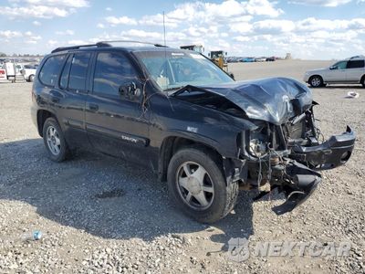 Czwarte zdjęcie samochodu z boku: 2003 GMC ENVOY VIN:1GKDT13S832102607 - miniatura