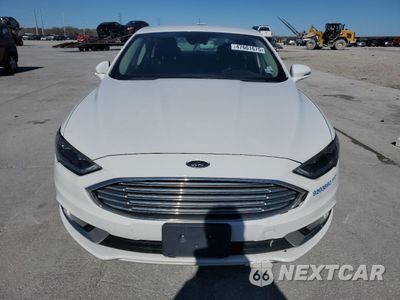 Piąte zdjęcie samochodu w środku: 2017 FORD FUSION SE HYBRID VIN:3FA6P0LU3HR409261 - miniatura